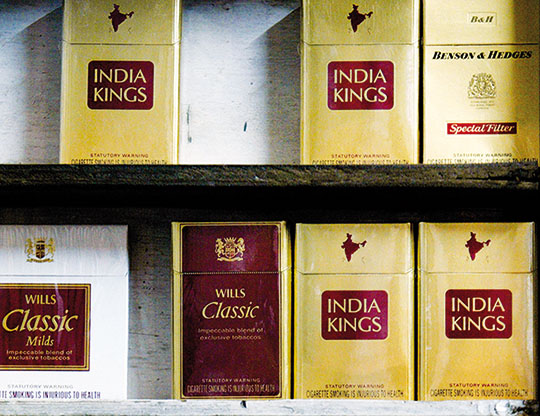 itc cigarettes ITC halts cigarette production over health warning rules
