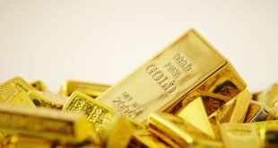 Gold falls on stronger dollar