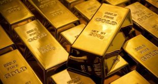 Gold slips, set for weekly loss on rate-hike fears